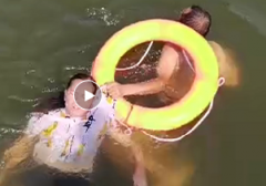 <b>女子跳水輕生，領(lǐng)威保安奮不顧身下水救人</b>